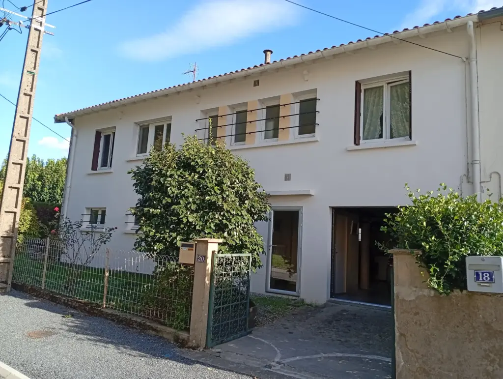 Maison mitoyenne de 85m² avec jardin et sous-sol